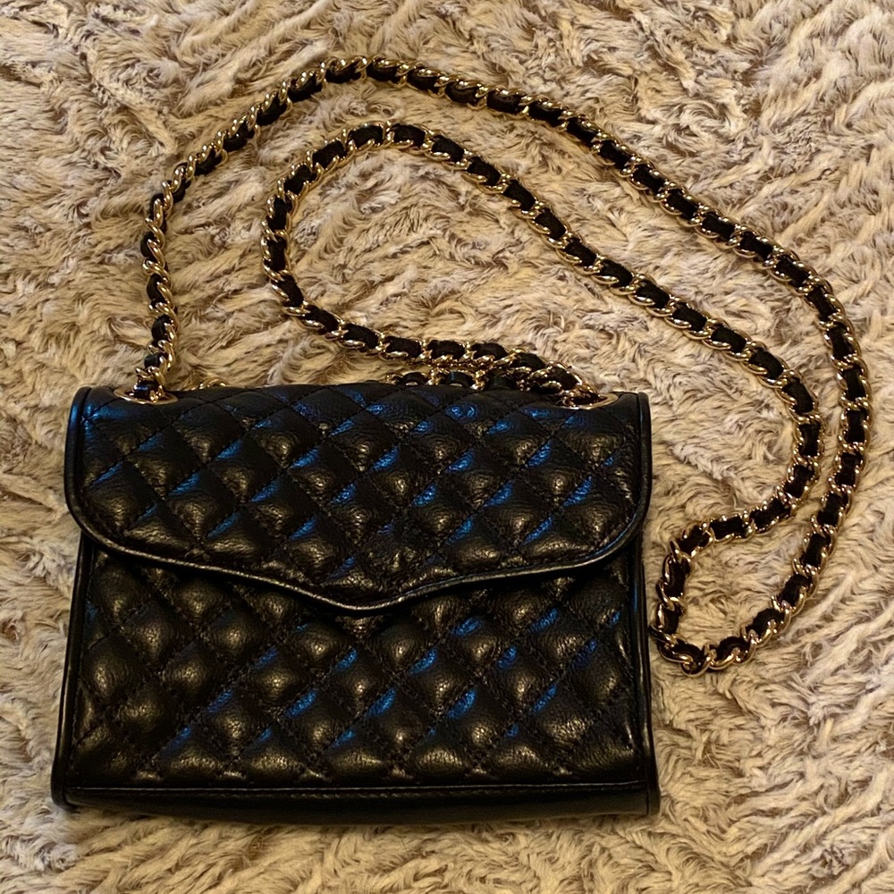 Black quilted leather Rebecca Minkoff bag. New never used.